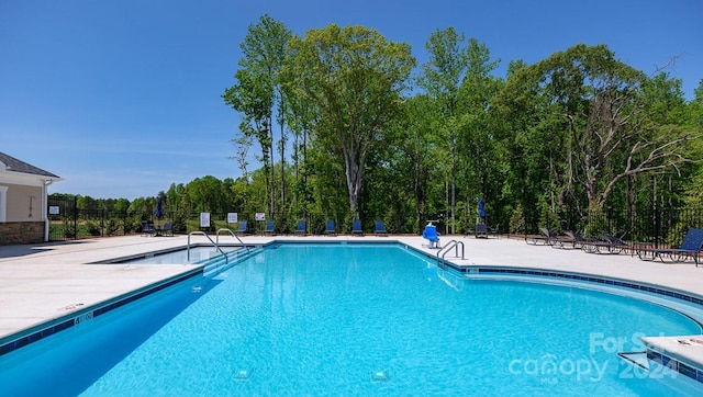 view of pool with a patio