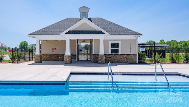 view of swimming pool with a patio area