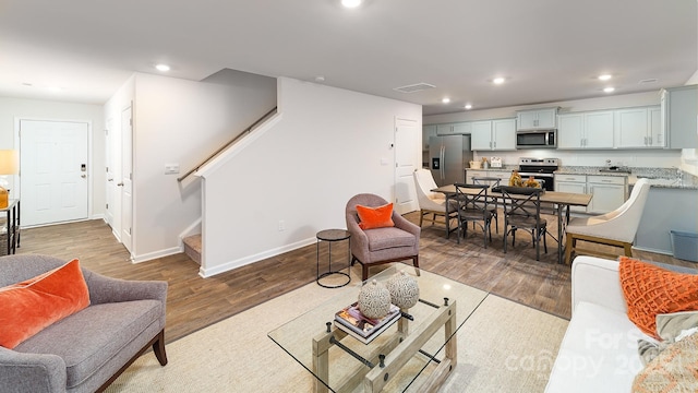 living room with wood-type flooring