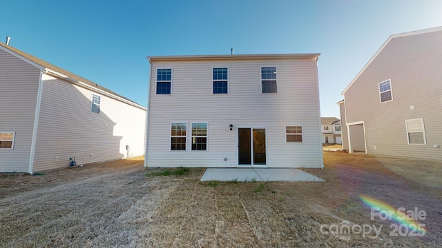 rear view of house with a patio