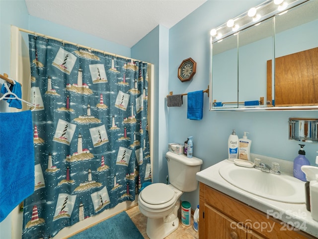 bathroom featuring vanity, curtained shower, toilet, and tile patterned floors