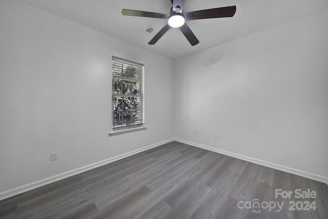 empty room featuring wood-type flooring and ceiling fan