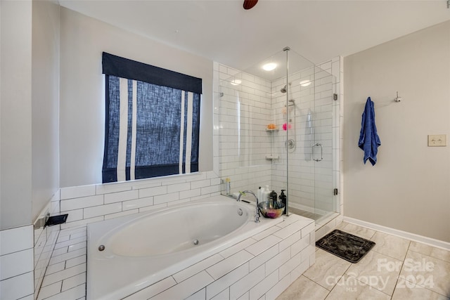 bathroom featuring tile patterned floors and independent shower and bath