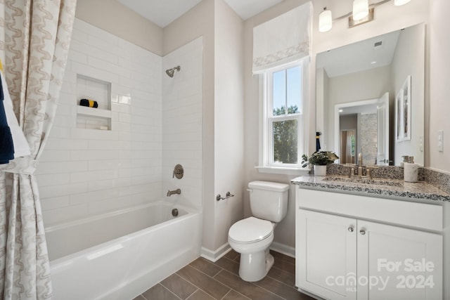 full bathroom featuring vanity, toilet, and shower / bathtub combination with curtain