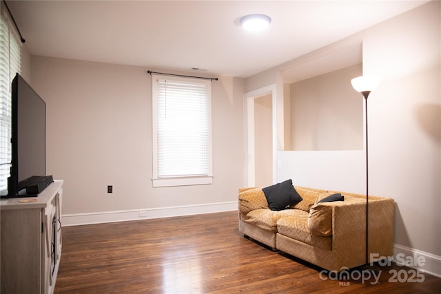 living area featuring dark hardwood / wood-style flooring