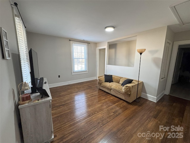 living room featuring dark hardwood / wood-style flooring