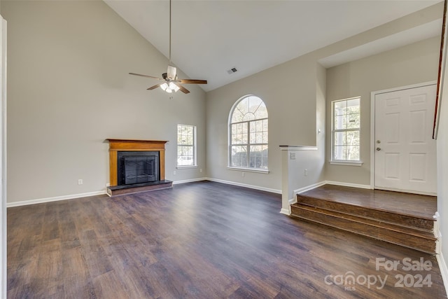 unfurnished living room featuring ceiling fan, high vaulted ceiling, and dark hardwood / wood-style flooring