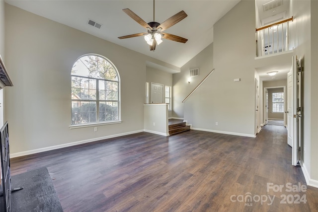 unfurnished living room featuring ceiling fan, high vaulted ceiling, and dark hardwood / wood-style flooring