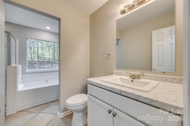 full bathroom featuring vanity, toilet, separate shower and tub, and tile patterned flooring