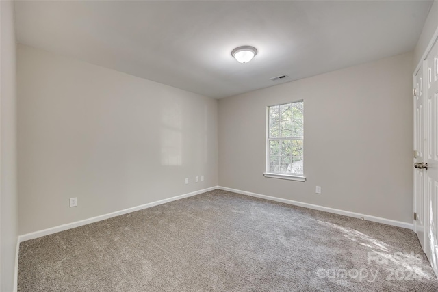 view of carpeted spare room