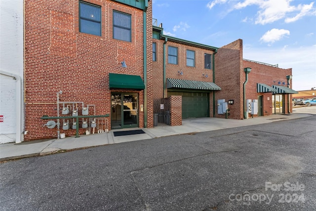 view of building exterior with a garage