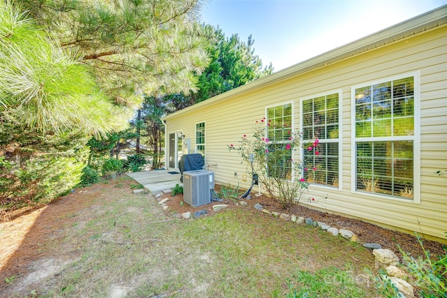 exterior space featuring central AC unit