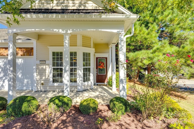 doorway to property with covered porch