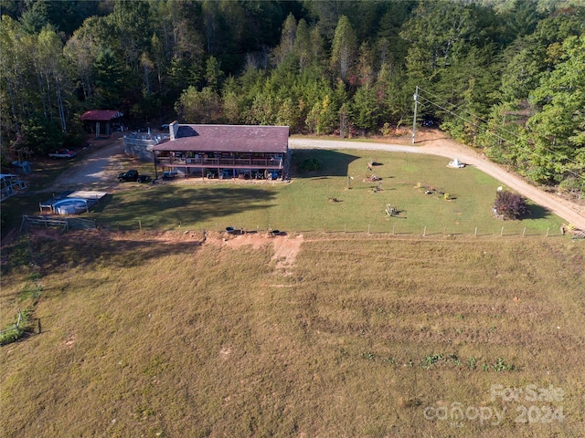 birds eye view of property featuring a rural view