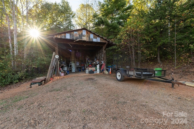 view of outbuilding featuring a carport