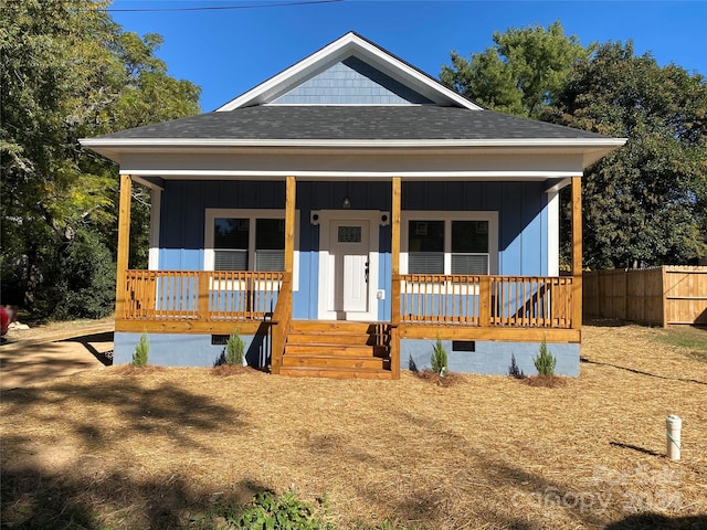 view of front of property featuring covered porch