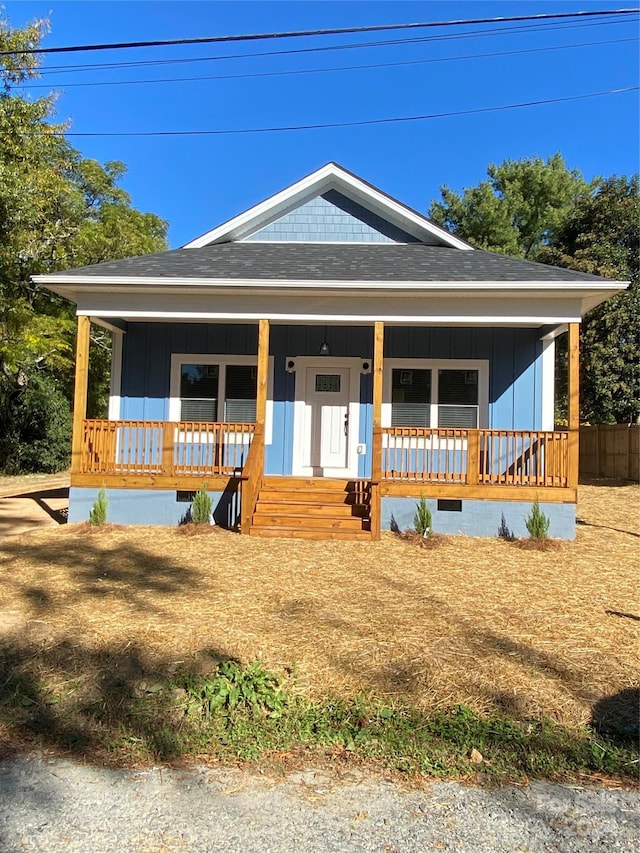 view of front of property featuring covered porch