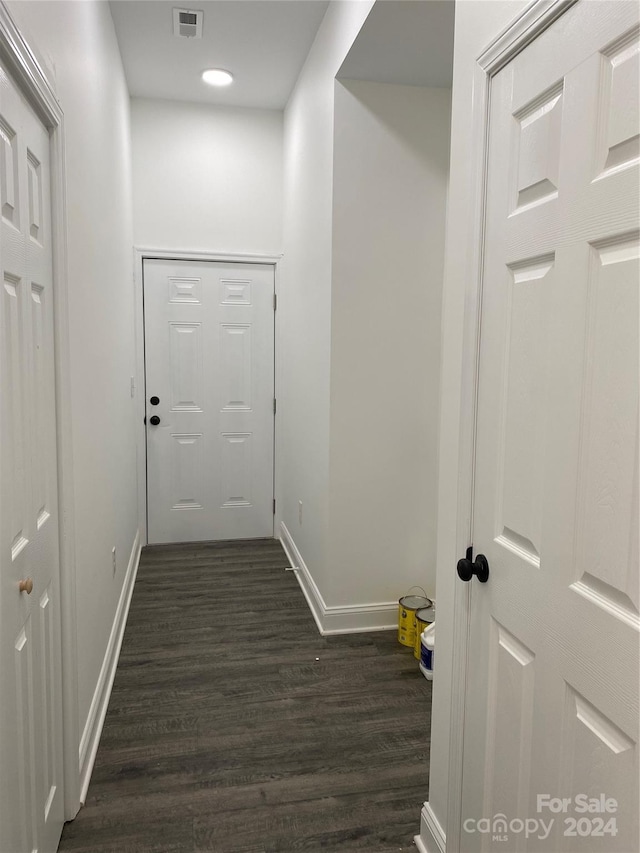 doorway to outside with dark hardwood / wood-style flooring