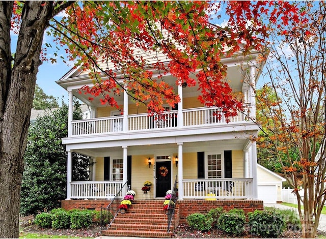 view of front of home with an outdoor structure and a garage