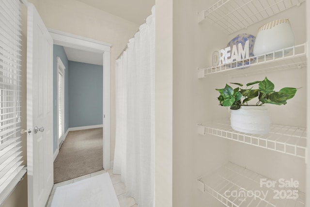 bathroom featuring tile patterned flooring