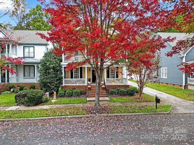 view of front of property featuring covered porch