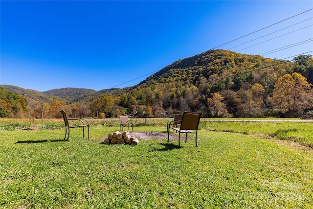 mountain view featuring a rural view