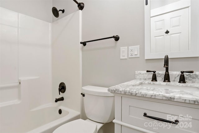 full bathroom with shower / bathtub combination, toilet, and vanity