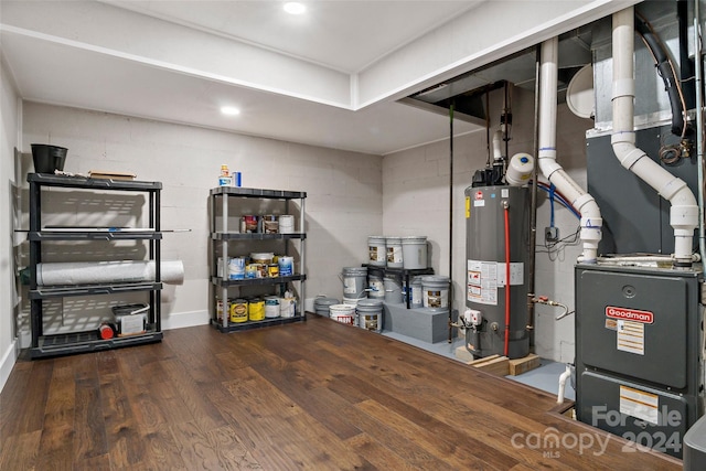 utility room featuring water heater