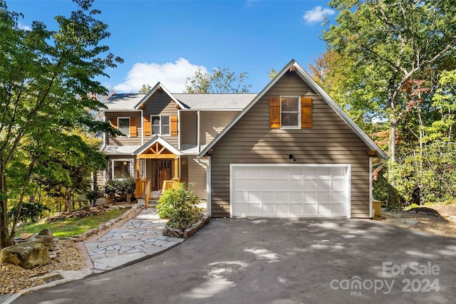 view of front of property featuring a garage