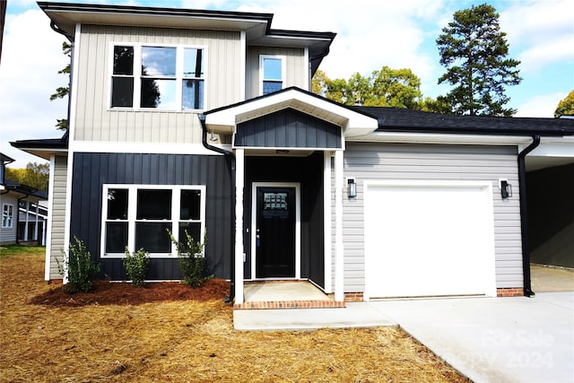 view of front of home with a garage