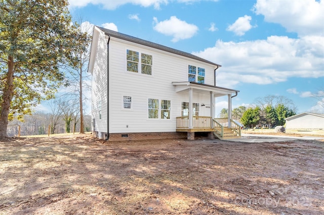 back of house with covered porch