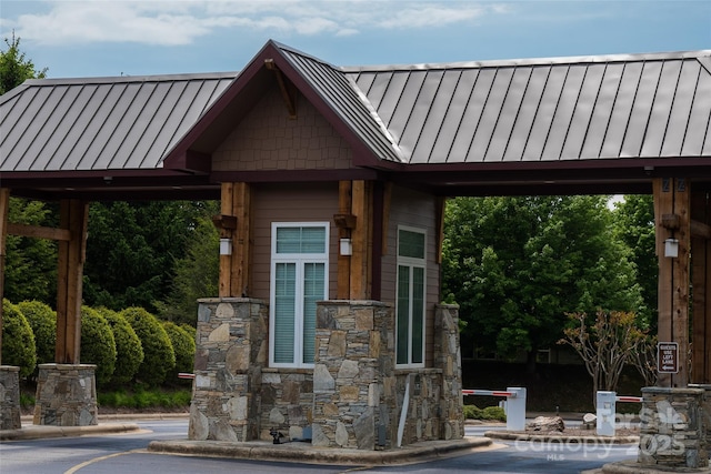 exterior space with a standing seam roof and metal roof