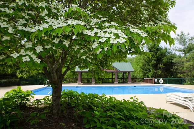 pool featuring fence