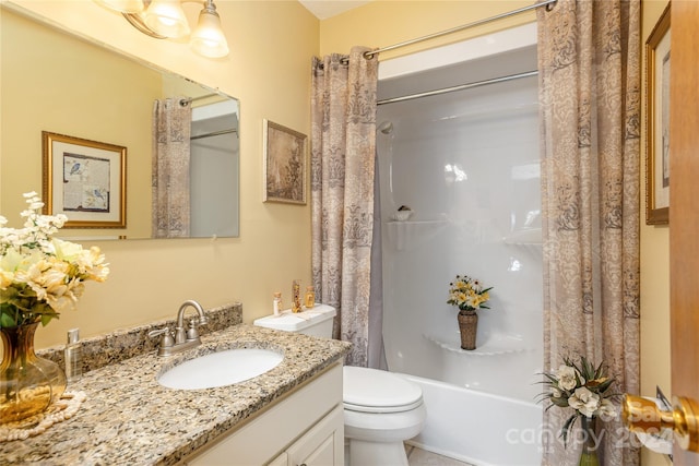 full bathroom featuring vanity, toilet, and shower / bath combo