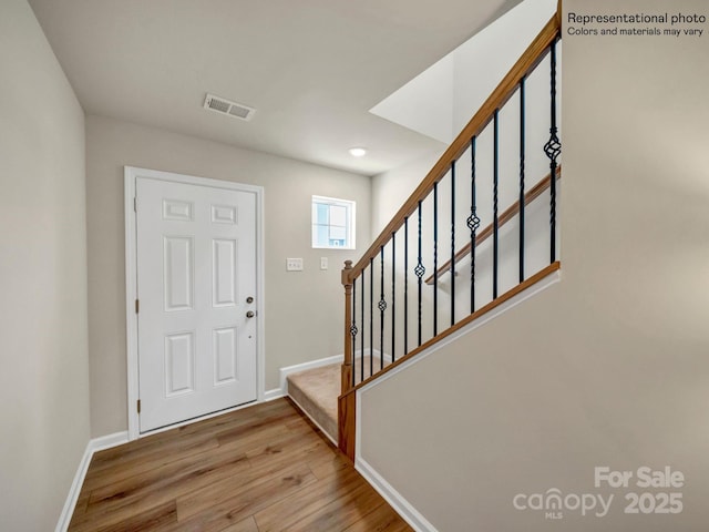 entrance foyer featuring light wood-type flooring