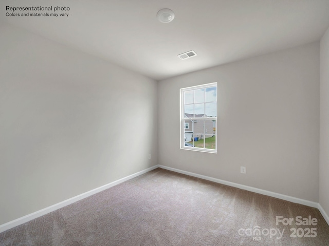 empty room featuring carpet