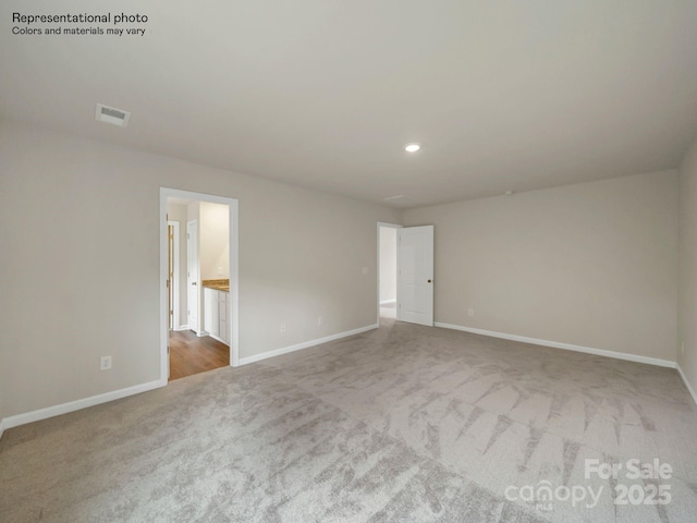 view of carpeted spare room