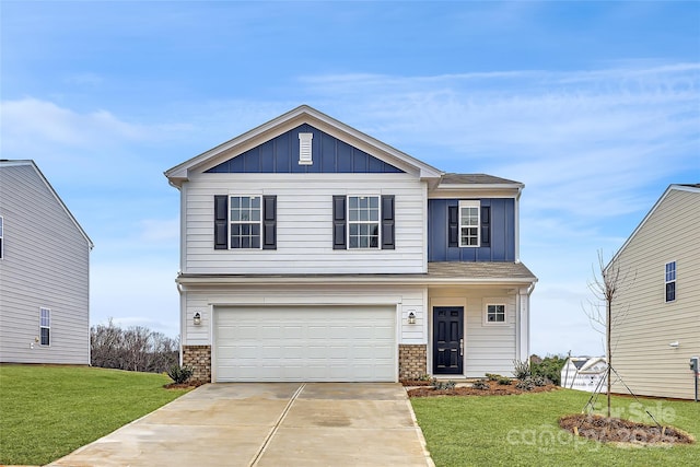 view of front of house featuring a front yard, an attached garage, concrete driveway, board and batten siding, and brick siding