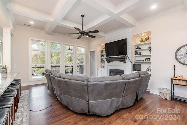 living room featuring a fireplace, ceiling fan, coffered ceiling, beam ceiling, and dark hardwood / wood-style floors