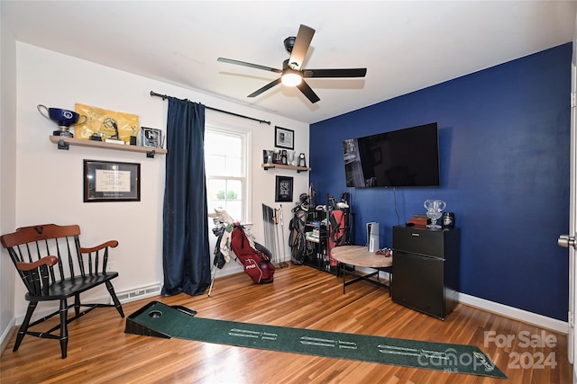 interior space featuring hardwood / wood-style flooring and ceiling fan