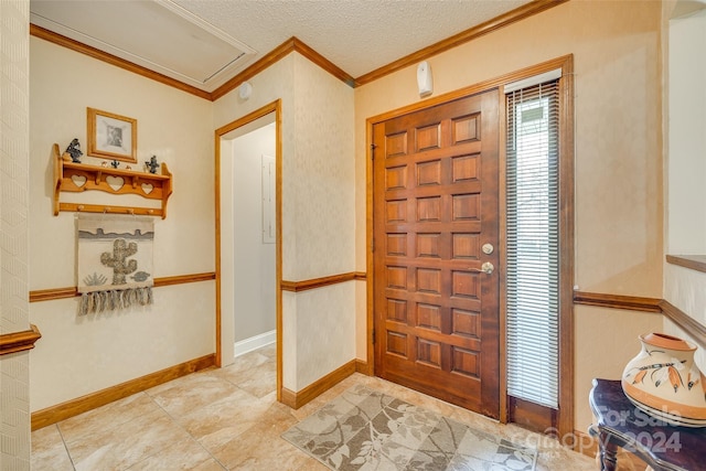 entryway featuring crown molding and a textured ceiling