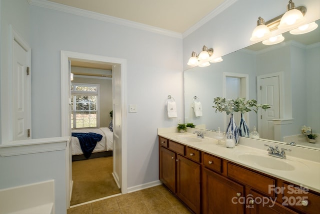 bathroom with vanity, tile patterned floors, and ornamental molding