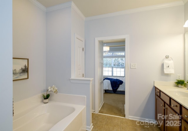 bathroom featuring a tub to relax in, crown molding, tile patterned flooring, and vanity