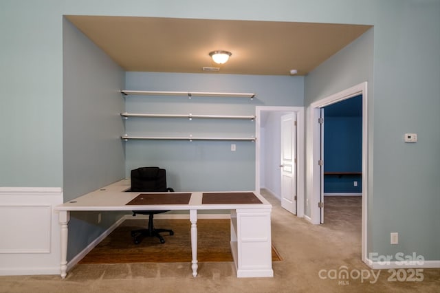 unfurnished office with light colored carpet