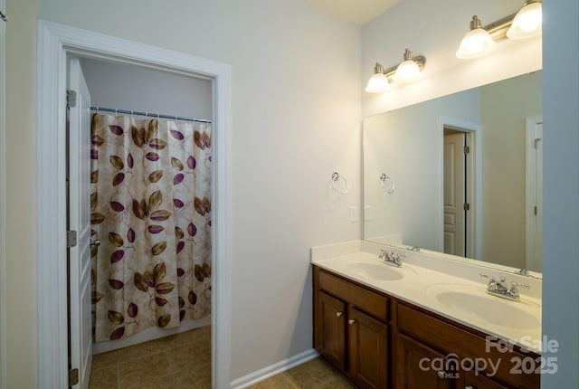 bathroom with vanity and walk in shower