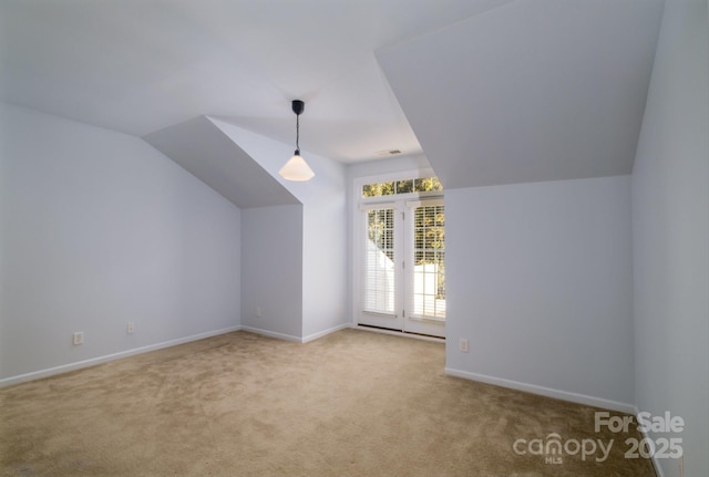 bonus room with carpet and lofted ceiling