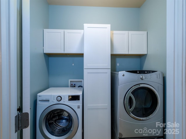 laundry area with cabinets and washer hookup