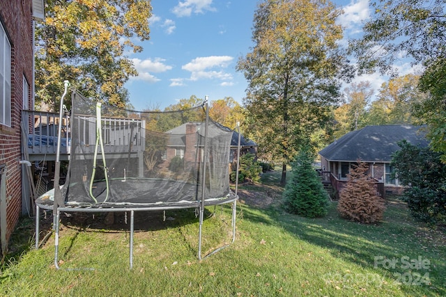 view of yard featuring a trampoline