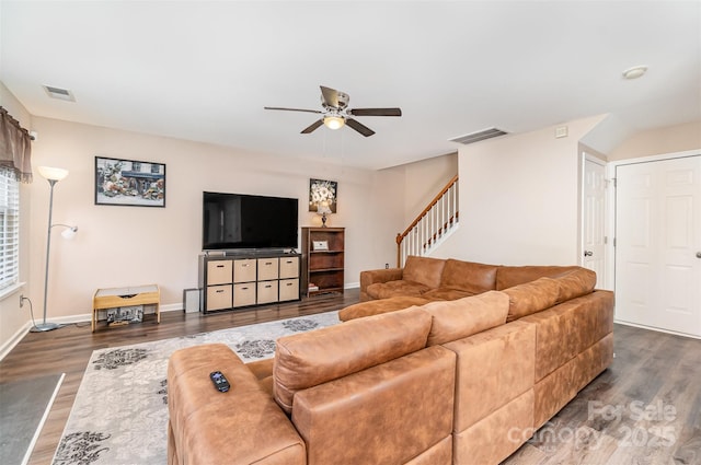 living room with dark hardwood / wood-style floors and ceiling fan