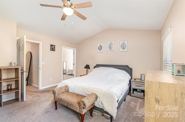 carpeted bedroom with lofted ceiling and ceiling fan